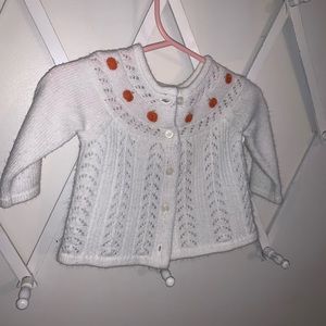 White cardigan with embroidered pumpkins